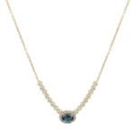 Κολιέ κίτρινο χρυσό με σχέδιο ριβιέρα με μπλε κέντρο και ζιργκον